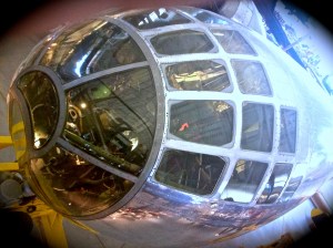 The front nose cone & canopy of the B-29 Enola Gay bomber. This huge aircraft occupies an amazing swath of the display floor in the hangar, with many airplanes tucked beneath its shadow.